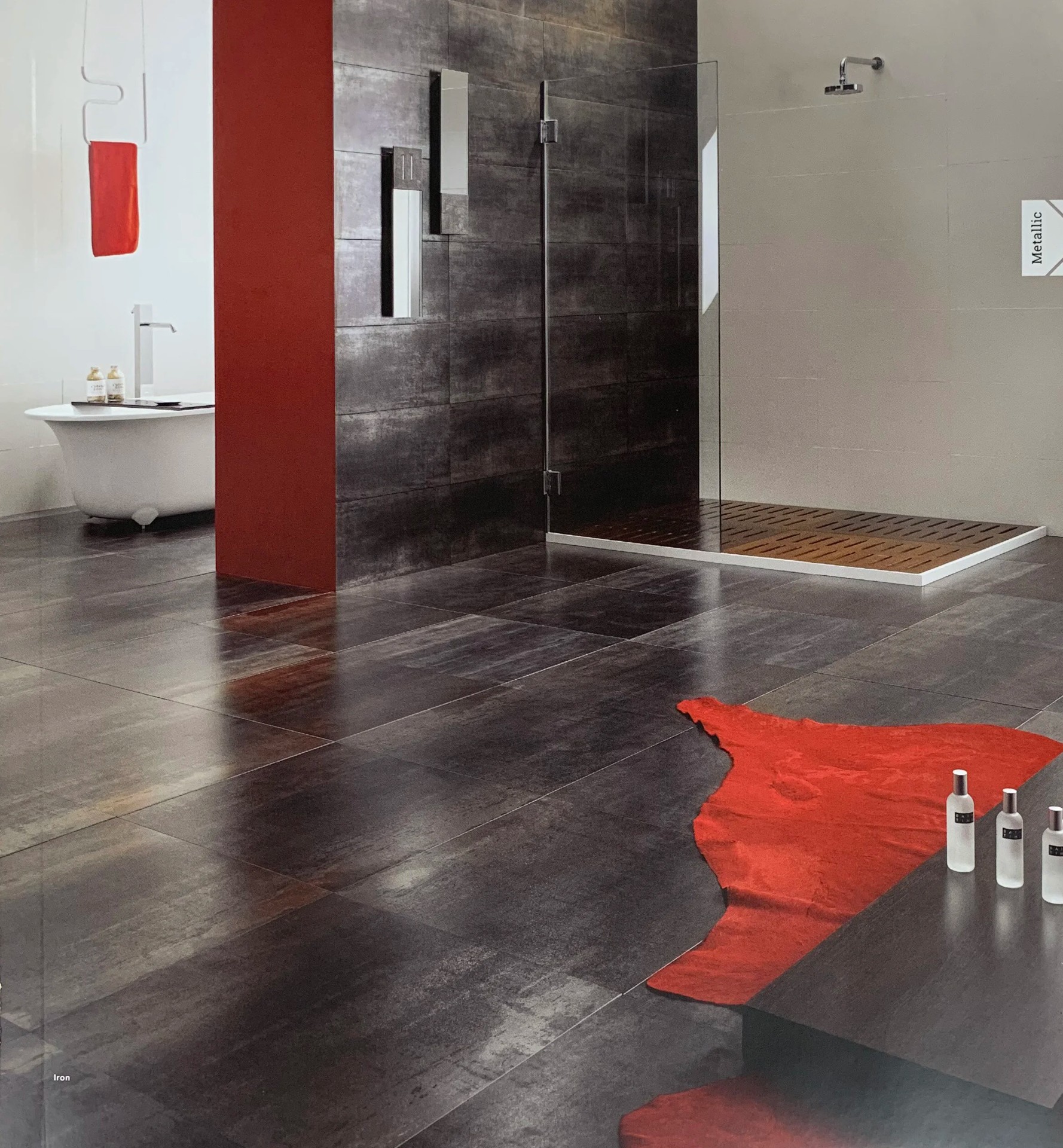 Bathroom with metallic dark tiles